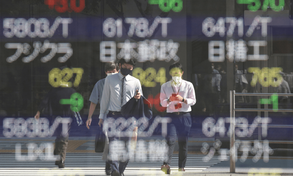 Asian Shares Up After Fed Lifts Rates To Tame Inflation